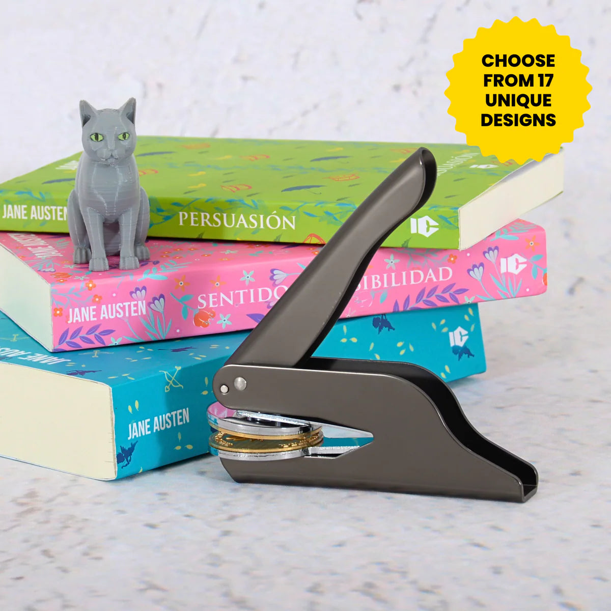 Close-up of cat lover’s embosser pressing a custom feline seal