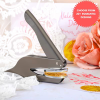 Embosser creating a love-themed seal on elegant stationery