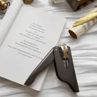 Personalized embosser featuring ancient runes and “From the Library of” text