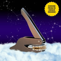 Custom embosser with astrological design stamping a birth chart motif