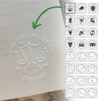 Embosser creating a zodiac symbol impression on paper